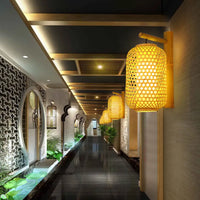 cylindrical openwork wall sconce design
